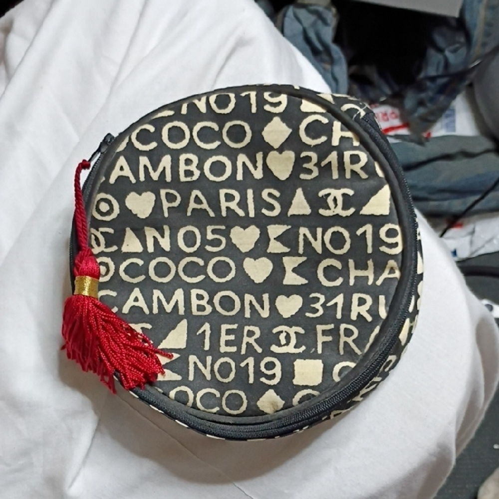 Chanel Black and White Round Pouch with Red Tassel